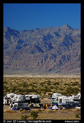 Camp and RVs at Stovepipe Wells, with Armagosa Mountains in the background. Death Valley National Park, California, USA.