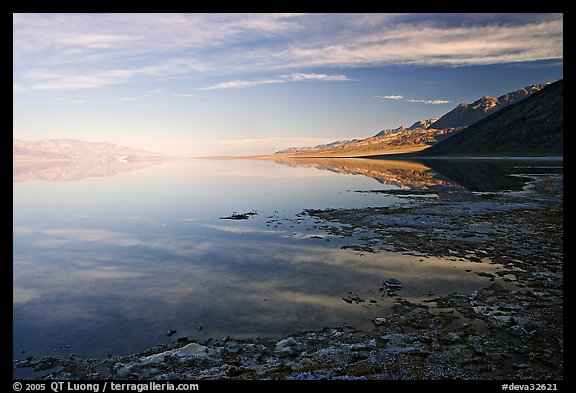 Flooded Badwater basin and Black mountain reflections, early morning. Death Valley National Park (color)