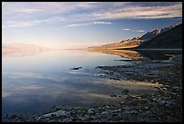 Flooded Badwater basin and Black mountain reflections, early morning. Death Valley National Park, California, USA. (color)