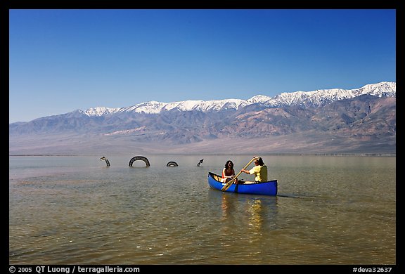 Canoe near the dragon in Manly Lake, below the Panamint Range. Death Valley National Park (color)