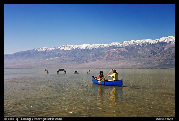 Canoe near the dragon in Manly Lake, below the Panamint Range. Death Valley National Park, California, USA.