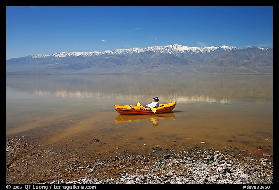 Kayaker near shore in Manly Lake. Death Valley National Park, California, USA.