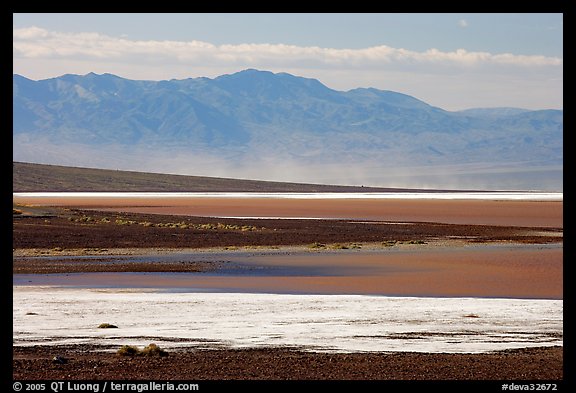 Salt Flats on Valley floor and Owlshead Mountains, early morning. Death Valley National Park, California, USA.