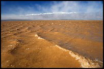 Extremely rare waves on mud-colored Manly Lake, early morning. Death Valley National Park ( color)