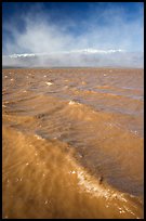 Waves on rarisime seasonal Death Valley Lake, early morning. Death Valley National Park, California, USA.