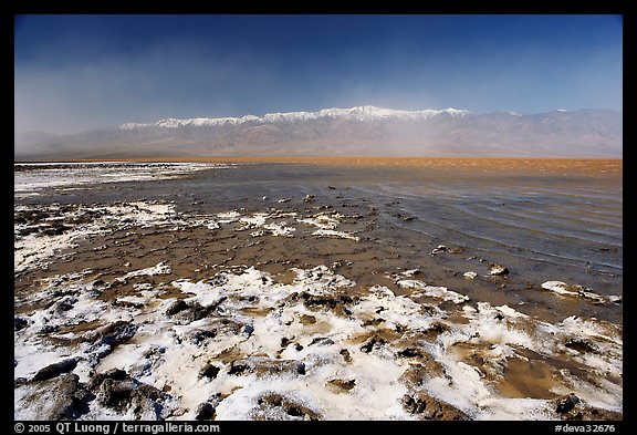 Salt formations and Manly Lake, morning. Death Valley National Park, California, USA.