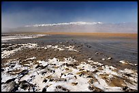 Salt formations and Manly Lake, morning. Death Valley National Park, California, USA.