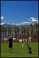 Golfer in Furnace Creek Golf course. Death Valley National Park, California, USA.