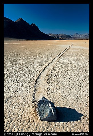 Sailing rock and travel groove on the Racetrack. Death Valley National Park, California, USA.