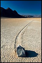Sailing rock and travel groove on the Racetrack. Death Valley National Park, California, USA. (color)