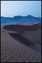 Sand dunes and Amargosa Range at dusk. Death Valley National Park ( color)