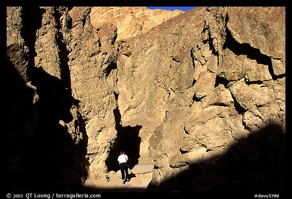 Hiker in Golden Canyon. Death Valley National Park, California, USA.