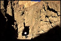 Hiker in Golden Canyon. Death Valley National Park, California, USA.