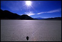 Moving rock on the Racetrack, mid-day. Death Valley National Park, California, USA.