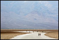 Tourists walking onto Salt Pan at Badwater. Death Valley National Park ( color)