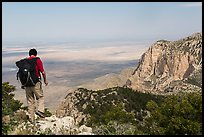 Hiker walking on Guadalupe Peak. Guadalupe Mountains National Park, Texas, USA. (color)