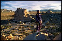 Climber getting ready to rappel down. Joshua Tree National Park ( color)