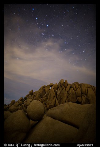 Geometrically shaped rocks and stars at night. Joshua Tree National Park, California, USA.