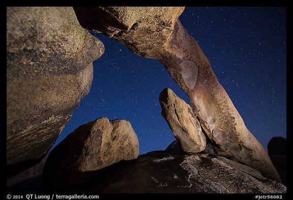 Arch Rock and starry sky. Joshua Tree National Park, California, USA.