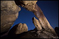 Arch Rock and starry sky. Joshua Tree National Park, California, USA.