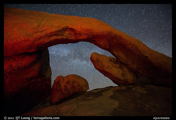 Arch Rock and night sky with Milky Way. Joshua Tree National Park, California, USA.