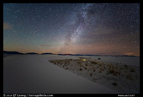 Backcountry camping area with lit tent at night. White Sands National Park (color)