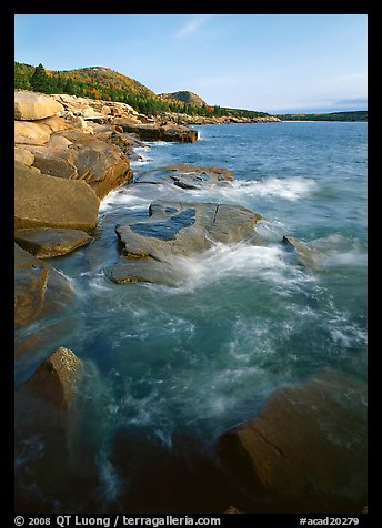 Pink granite slabs on the coast near Otter Point, morning. Acadia National Park, Maine, USA.