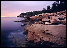 Coastline with granite slabs near Otter Point, sunrise. Acadia National Park, Maine, USA.