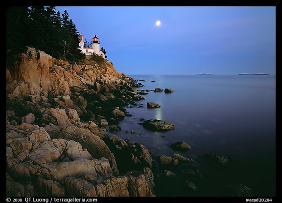 Bass Harbor Lighthouse, moon and reflection. Acadia National Park, Maine, USA.