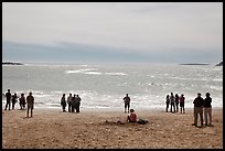 People looking at ocean from Sand Beach. Acadia National Park, Maine, USA. (color)