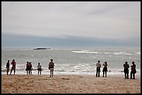 People standing on Sand Beach. Acadia National Park, Maine, USA.