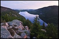 Forested hills and Jordan pond from above at dusk. Acadia National Park, Maine, USA.