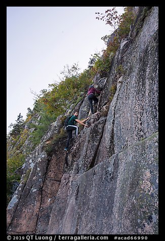 Hikers on vertical section of Precipice Trail. Acadia National Park (color)