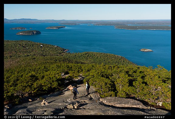 Hikers descending Champlain Mountain. Acadia National Park (color)