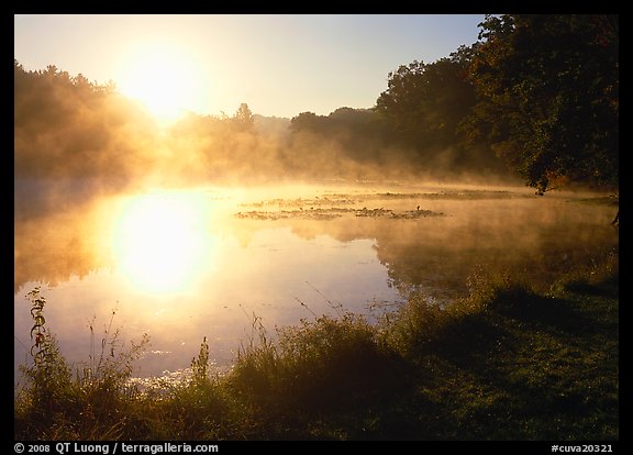 Sun shining through mist, Kendall Lake. Cuyahoga Valley National Park, Ohio, USA.