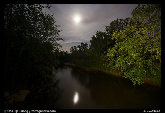 Cuyahoga River and moon at night. Cuyahoga Valley National Park, Ohio, USA.