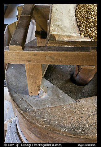 Corn being grinded into flour, Mingus Mill, North Carolina. Great Smoky Mountains National Park, USA.