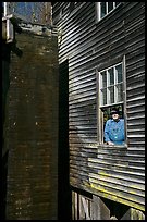 Miller standing at window, Mingus Mill, North Carolina. Great Smoky Mountains National Park, USA. (color)
