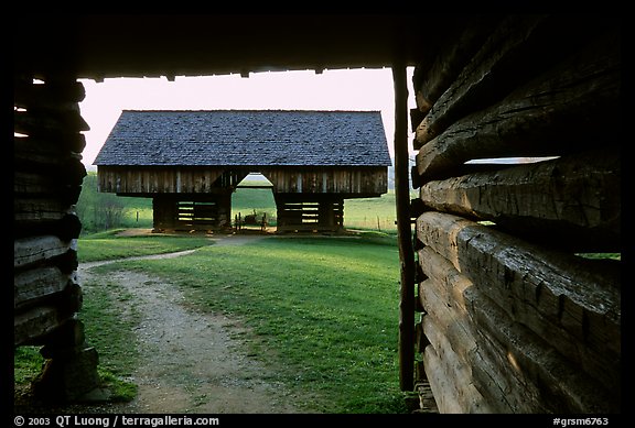 Cantilever barn framed by doorway, Cades Cove, Tennessee. Great Smoky Mountains National Park, USA.