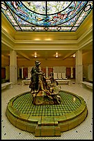 Statue of Desoto receiving gift from Caddo Indian maiden in mens bath hall. Hot Springs National Park, Arkansas, USA. (color)