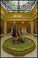 Statue of Desoto receiving gift from Caddo Indian maiden in mens bath hall. Hot Springs National Park, Arkansas, USA.