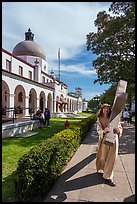 Man dressed as Jesus walking with cross on Bathhouse Row. Hot Springs National Park ( color)