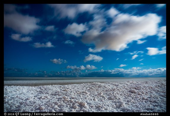 Shelf ice and moving clouds at night, West Beach. Indiana Dunes National Park (color)