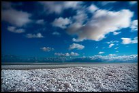 Shelf ice and moving clouds at night, West Beach. Indiana Dunes National Park, Indiana, USA.