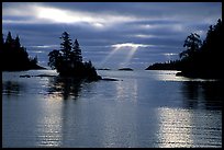 Sunrays and islet,  Chippewa harbor. Isle Royale National Park, Michigan, USA.