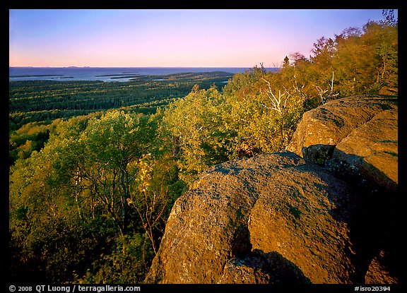 Mount Franklin outcrop, trees, and Lake Superior in the distance. Isle Royale National Park, Michigan, USA.