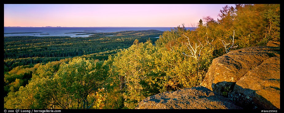 Rocky bluff overlooking island with Lake Superior in the distance. Isle Royale National Park, Michigan, USA.