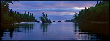 Cloudy sunrise on north woods lake. Isle Royale National Park (Panoramic color)