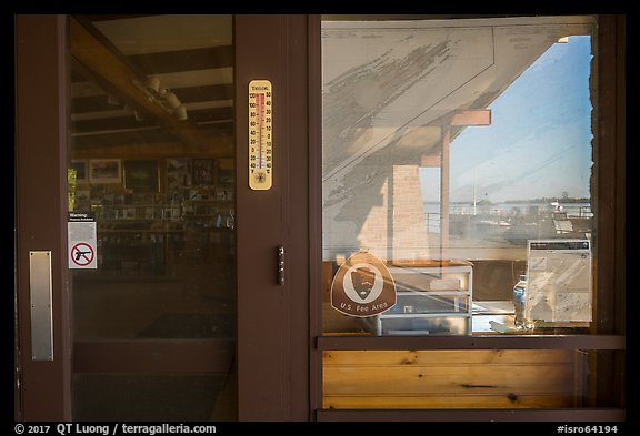 Snug Harbor and store window reflexion, Rock Harbor Visitor Center. Isle Royale National Park, Michigan, USA.