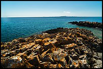 Lichen-covered rocks, Lake Superior, and Isle Royale from Passage Island. Isle Royale National Park ( color)